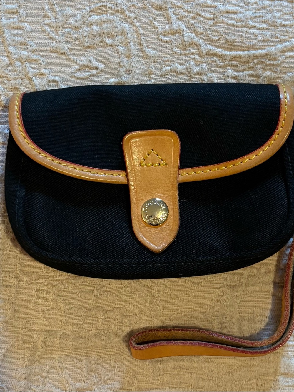 Dooney & Bourke Black Canvas Wristlet with Tan Leather Trim